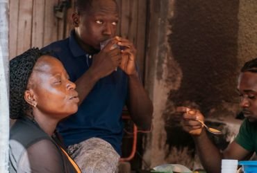 Children in school uniforms sitting